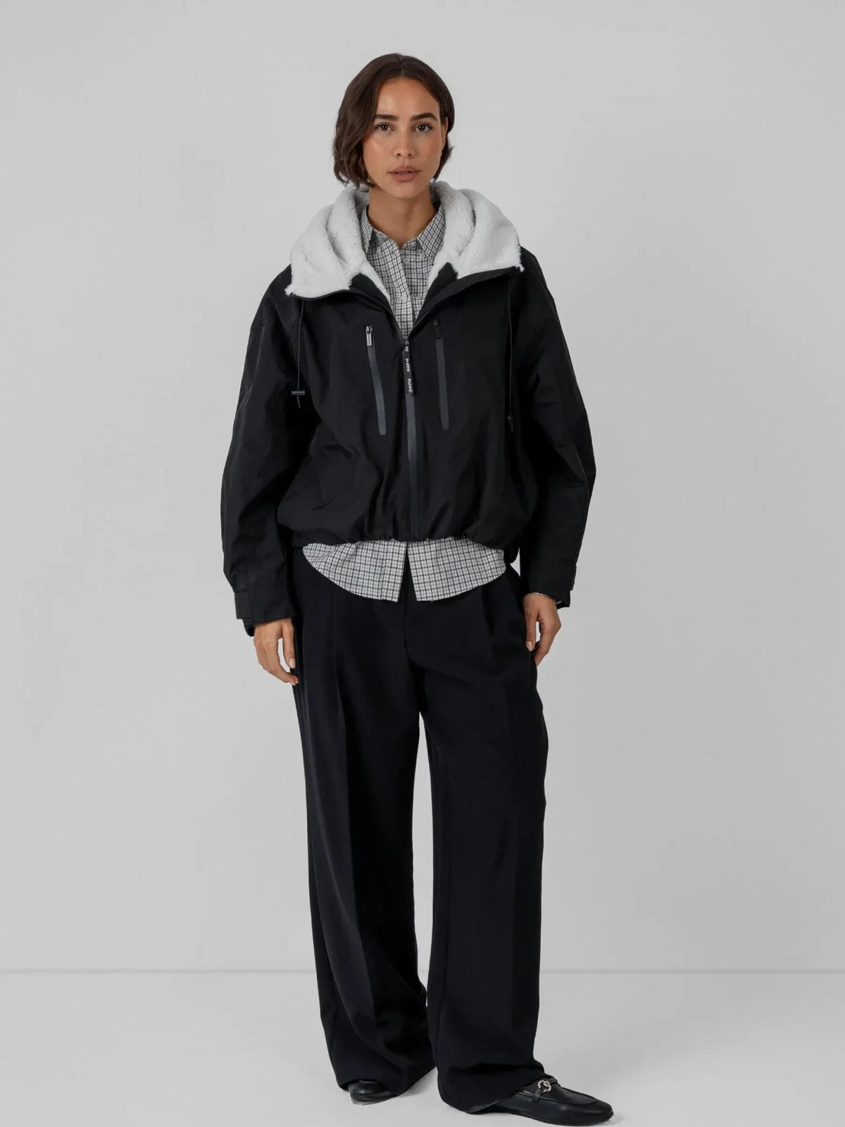 Chaqueta impermeable oversize y de talla única con tecnología STM-TEX™.