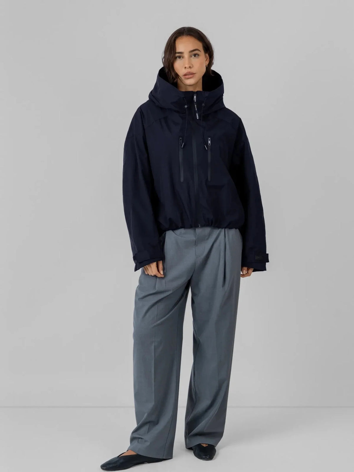 Chaqueta impermeable oversize y de talla única con tecnología STM-TEX™.