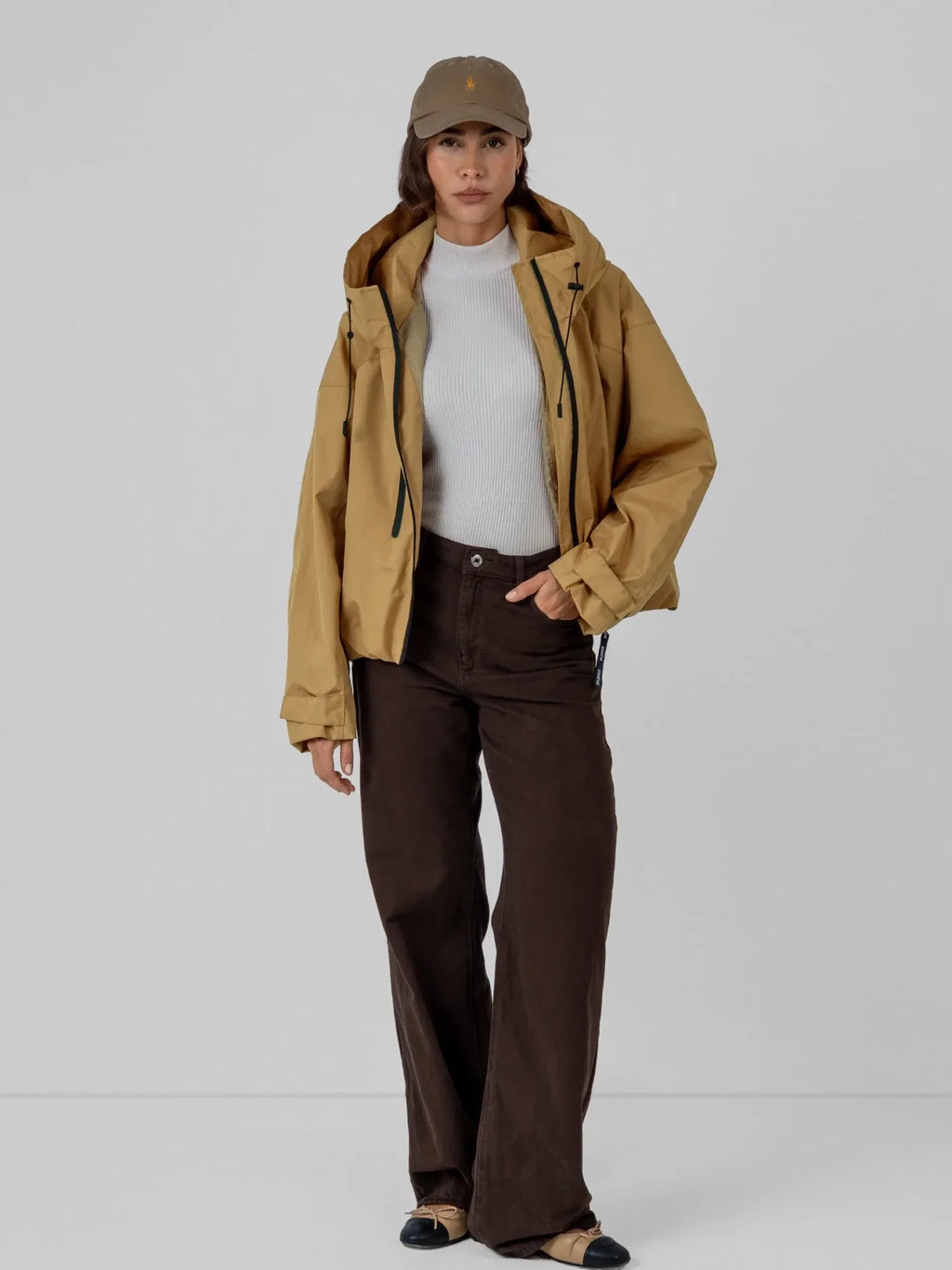 Chaqueta impermeable oversize y de talla única con tecnología STM-TEX™.