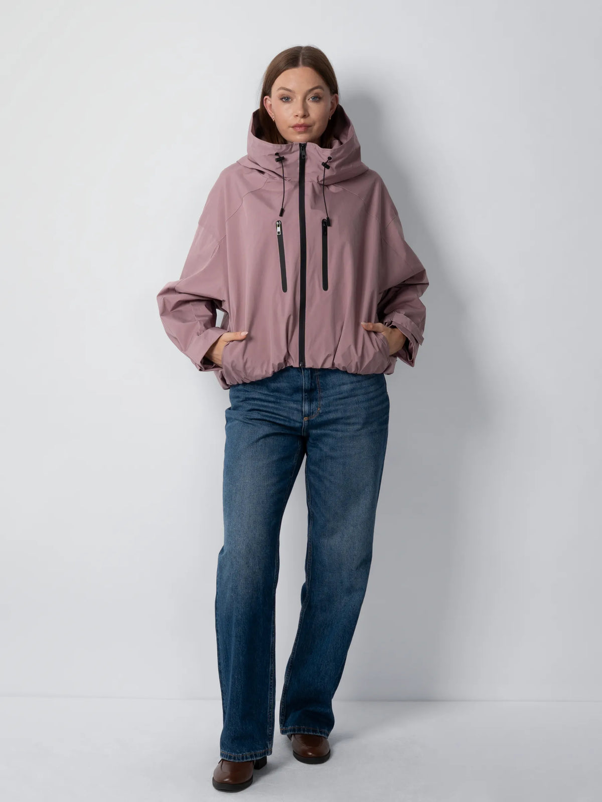 Chaqueta impermeable oversize y de talla única con tecnología STM-TEX™.